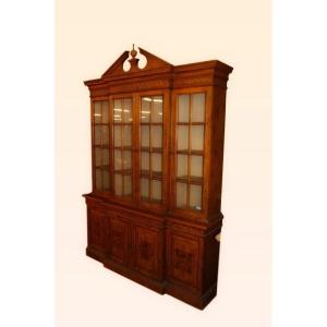 Libreria italiana della prima metà del 1900 in legno di frassino e radica di frassino. Presenta
