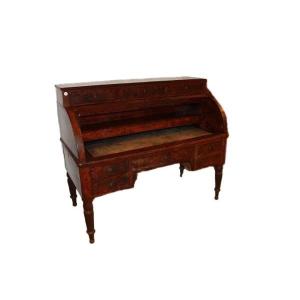 Grande scrivania francese di metà 1800, stile Direttorio, in legno di mogano e piuma di mogano.