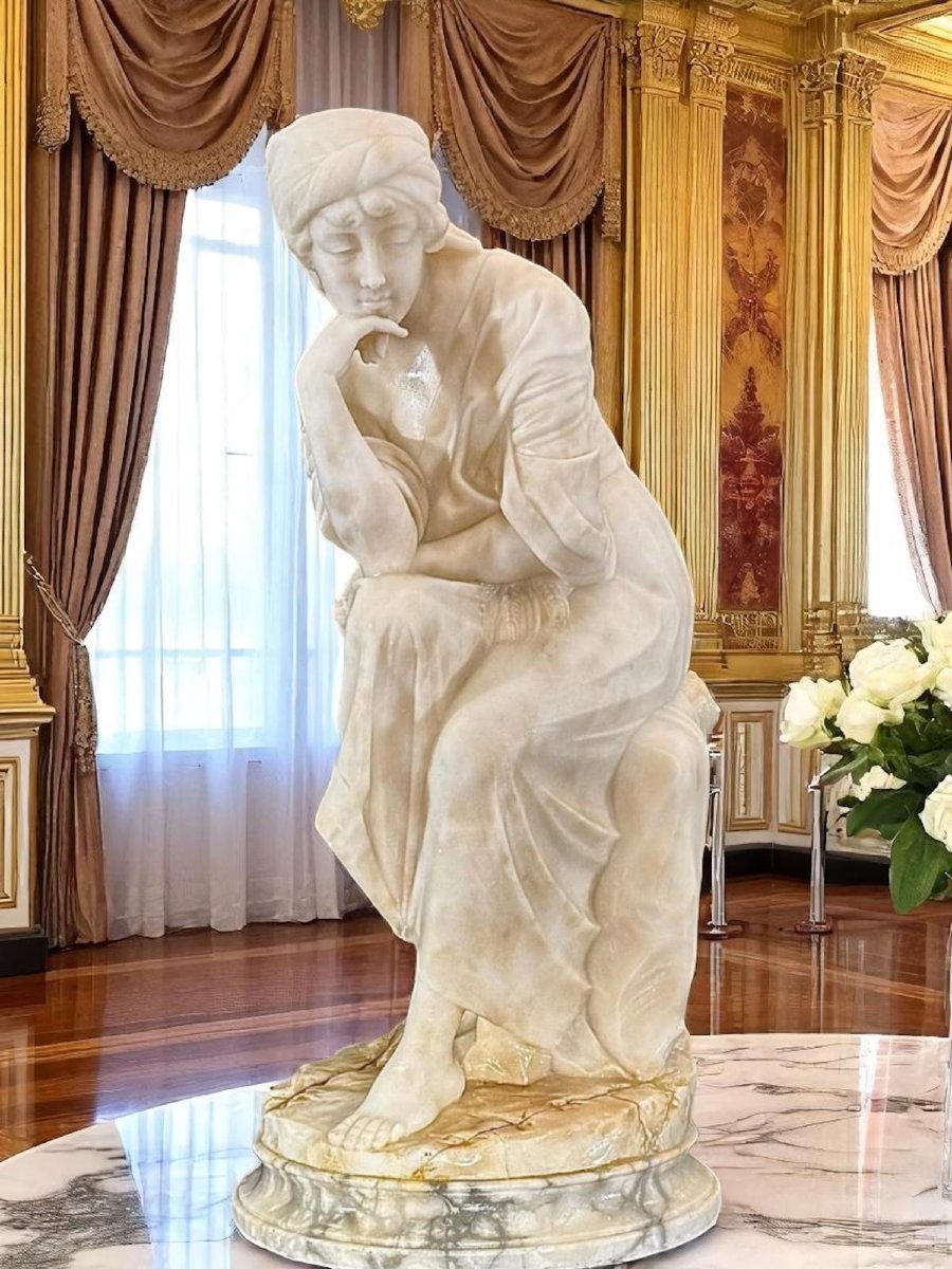 Statua raffigurante una donna seduta, con una mano sul mento • Guglielmo PUGI -photo-2