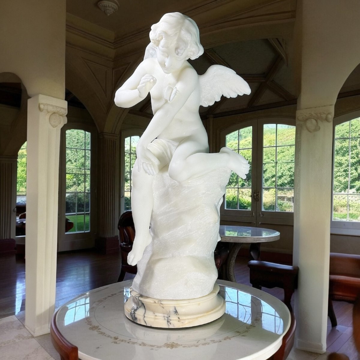 Statua raffigurante un angioletto felice che gioca con una farfalla, Marmo di Carrara, Pugi-photo-1