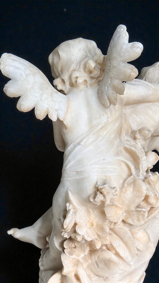 Statua raffigurante due Cherubini che litigano gioiosamente in Marmo-photo-1