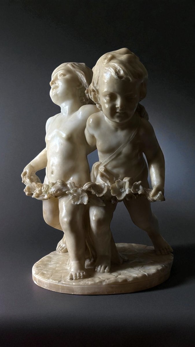 Statua raffigurante Putti con ghirlande di fiori -photo-3
