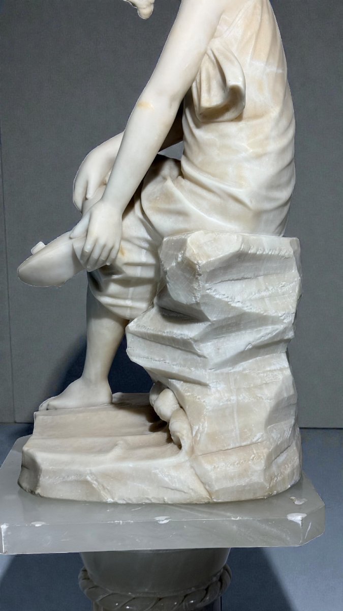 Statua giovane fanciulla sorridente -photo-4