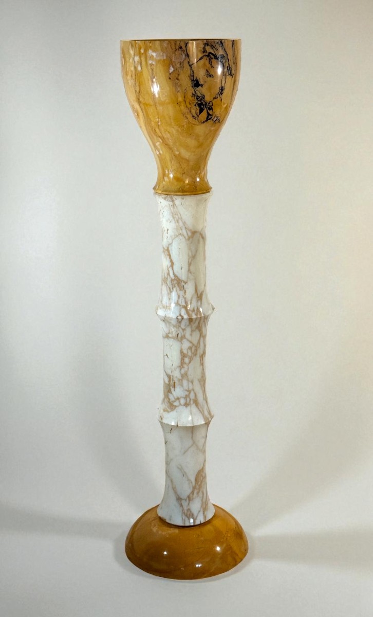 Colonna di Design in Marmo Calacatta Oro e Marmo Giallo Siena con venature Grigie e Nere