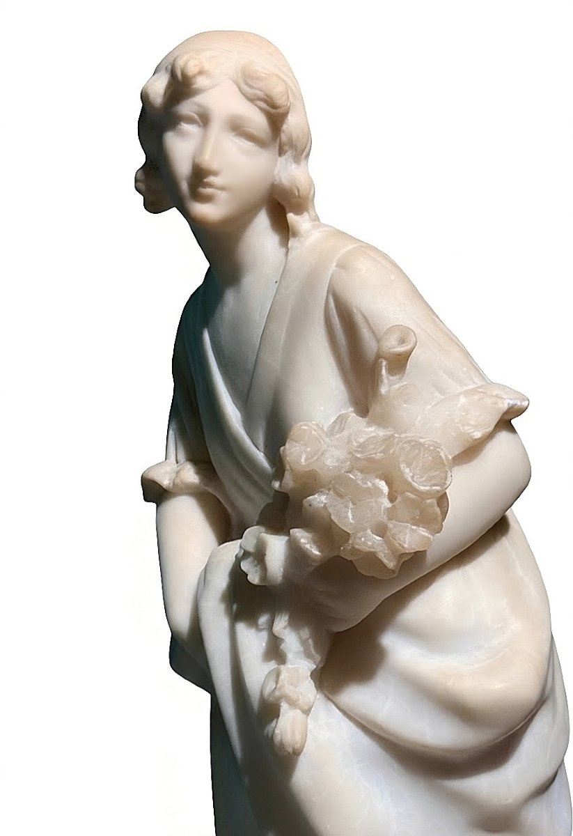 Statua raffigurante una bambina con fiori -photo-3