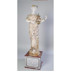 Statua monumentale raffigurante Ebe, dea greca della giovinezza, che suona la lira, Marmo 