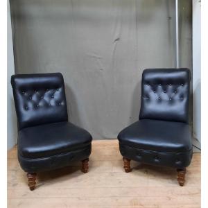 Pair Of Black Padded Armchairs