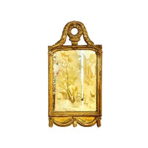 18th Century Louis XVI Giltwood Mirror With Laurel Crest And Draped Base