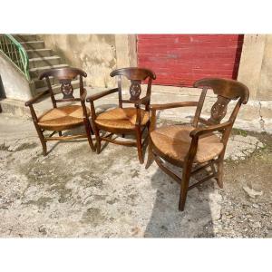 Set Of Three Provencal Walnut Armchairs From The 19th Century.