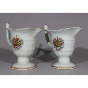 A Pair Of 18th Century Dutch Qianlong Market Armorial Helmet Cream Pitchers