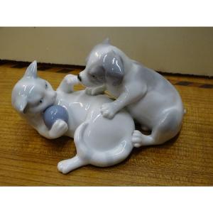 Porcelain Kitten And Puppy Playing Group