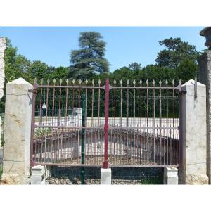 Wrought Iron Gate And Its Pair Of Pillars