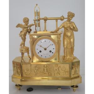 Pendule Empire En Bronze Doré signée Binjé "la découverte de l'électricité statique"