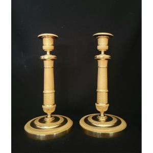 Pair Of Gilt And Chased Bronze Candlesticks, Empire Period Circa 1815