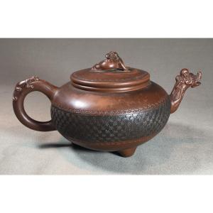 Yixing Stoneware Three Creatures Teapot, Qing Dynasty.