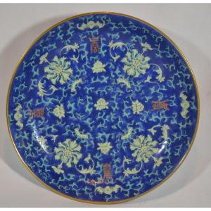 Porcelain Dish Enamelled With Lotus Flowers On A Blue Background. China, 19th Century.