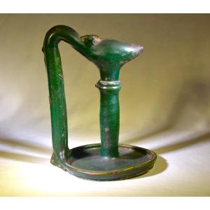 Green Glazed Earthenware Oil Lamp. Morocco, 19th Century.