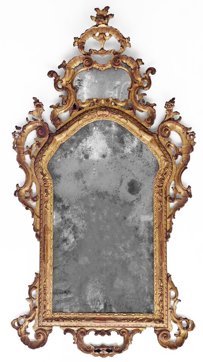 Specchiera in legno intagliato, scolpito e dorato. Venezia, metà XVIII secolo