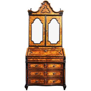 Trumeau lastronato in legno e radica di noce con cornici ebanizzate. Lombardia, XVIII secolo