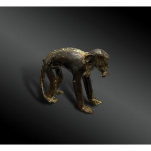 Statuette Depicting A Monkey With A Banana In Its Mouth - Ivory Coast