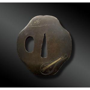 Tsuba Otafuku Mokko - Japan - Edo Period (1603-1868)