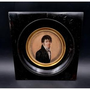 Large Circular Miniature Of A Young Man From The Directoire Period Against A Sepia Background