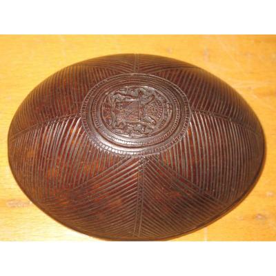 Carved Coconut Coat Of Arms