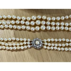 Three-strand Cultured Pearl Necklace. Flower Clasp In White Gold, Pearl, And Diamonds.