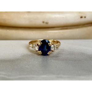 Yellow Gold Ring, 2-carat Oval Sapphire And Pear-shaped Diamonds Totaling 0.80 Carats