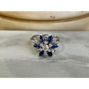 Flower Ring In White Gold, Marquise Sapphires (1 Carat), Baguette And Ta Diamonds Totaling 0.31 Carats