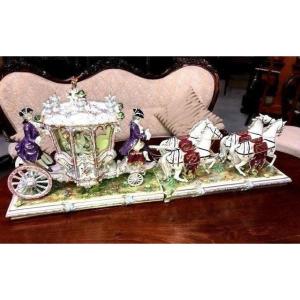 A Carriage Group In Porcelain