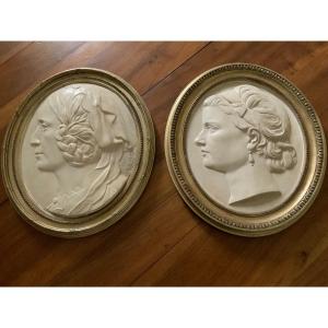 Pair Of Bas-reliefs In White Terracotta, Monogrammed And Dated 1869 And 1873