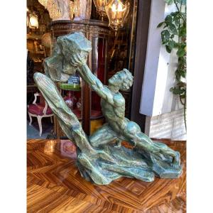 Art Deco Sculpture In Bronze With Green Patina, The Man With The Stone Signed Ouline