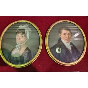 Paire de portrait Homme / Femme, dans cadres medaillon dorés Signées Jourdain An XIII