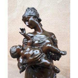 Bronze Sculpture Of A Mother Carrying Her Child, By Auguste Moreau
