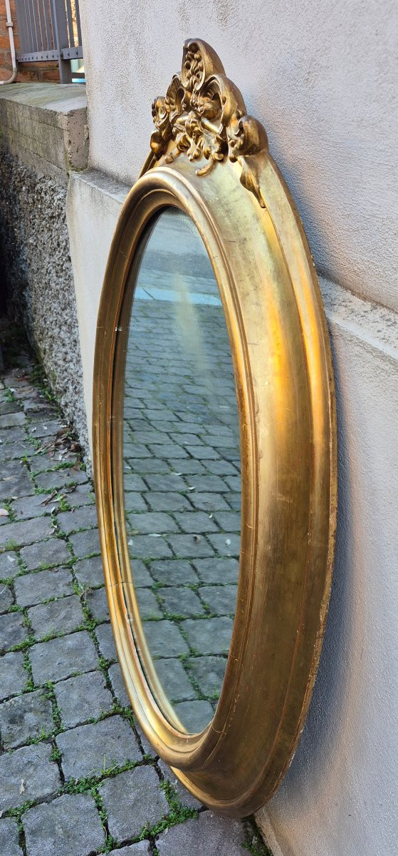 Specchiera ovale dorata antica con cimasa-photo-1