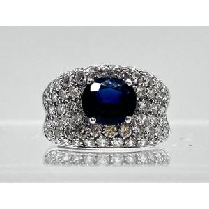 Cocktail Ring In 18-carat White Gold Paved With Brilliants And Set With A Blue Sapphire