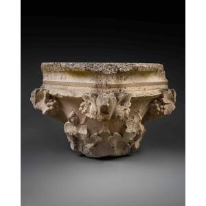 Capital Decorated With Foliage And Grapes