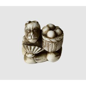 Netsuke Made Of Deer Antlers, Fruit Seller With Monkey Mask.