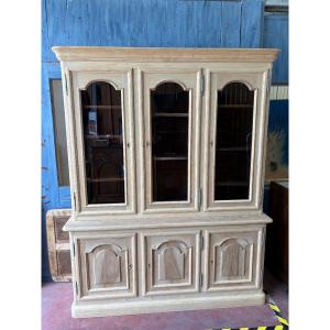 Bookcase Opening With Six Natural Wood Doors