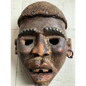 African Wood And Raffia Mask