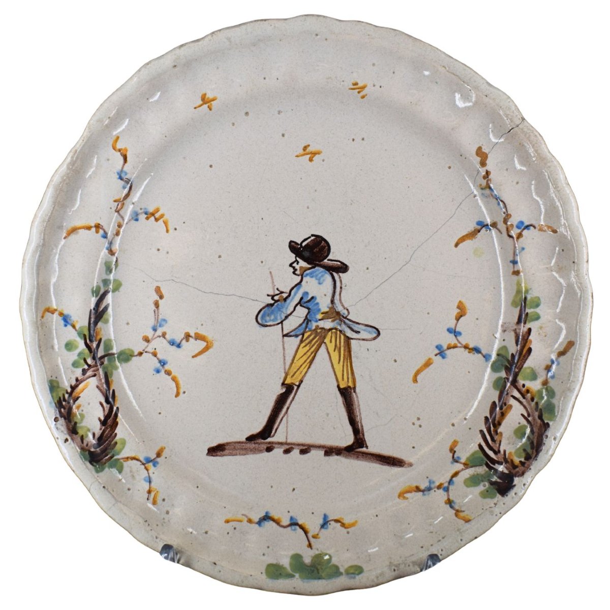 Piatto in maiolica con viandante e racemi Borghetto Lodigiano, XVIII secolo
