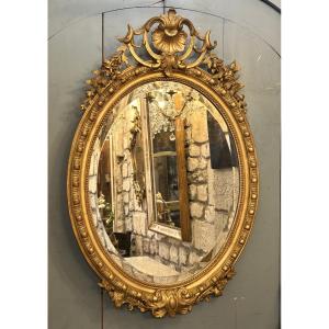 Oval Mirror In Gilded Wood 