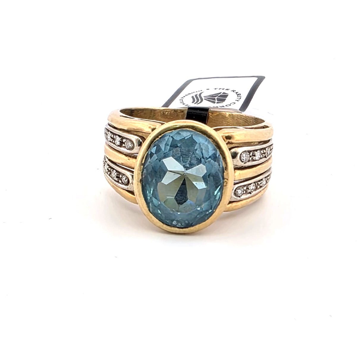 Anello anni 90' in oro giallo 18 kt massiccio con grande topazio azzurro e diamanti ai lati del-photo-2