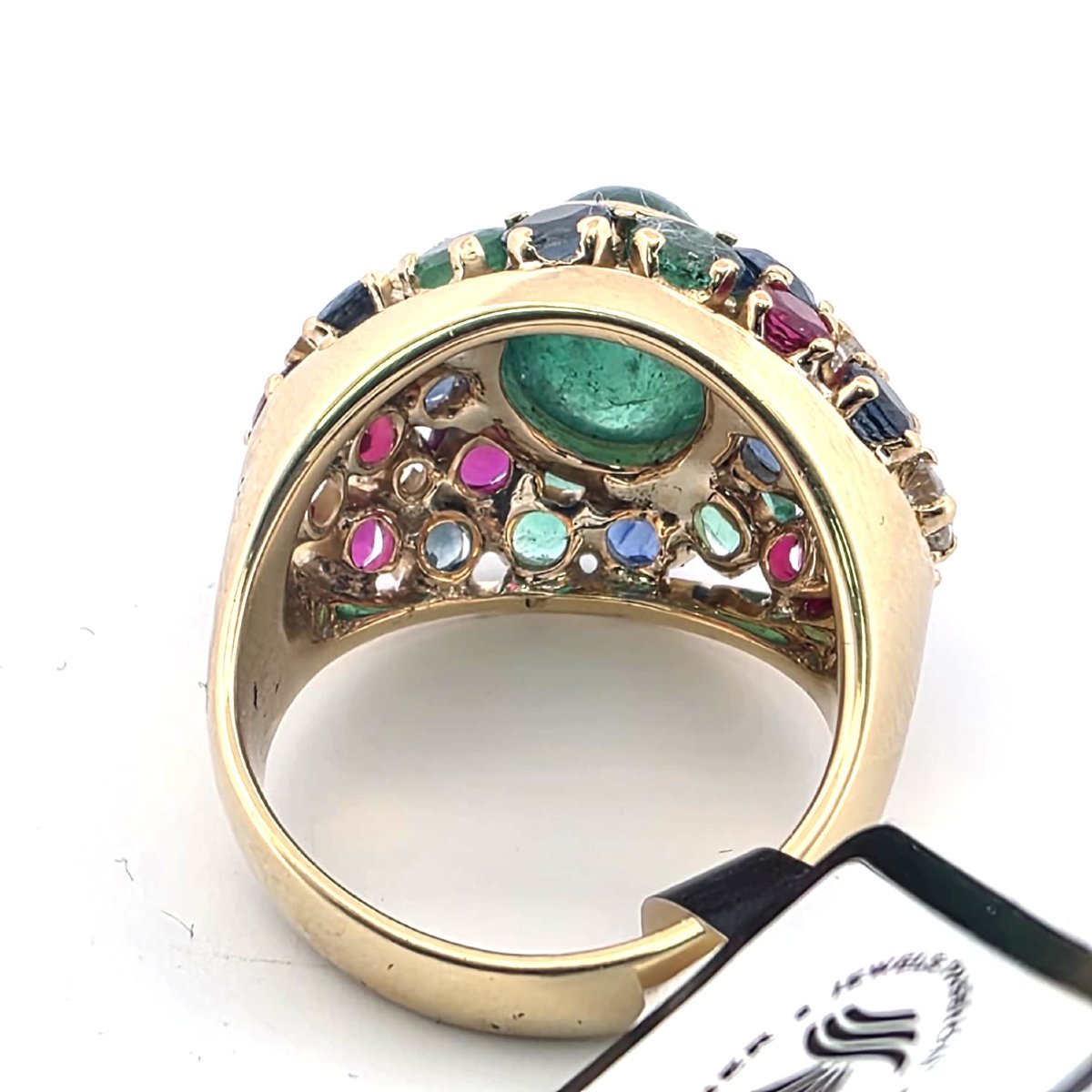 Anello anni 80'/90' in oro giallo 18kt con smeraldo centrale e miscela di pietre preziose a con-photo-1