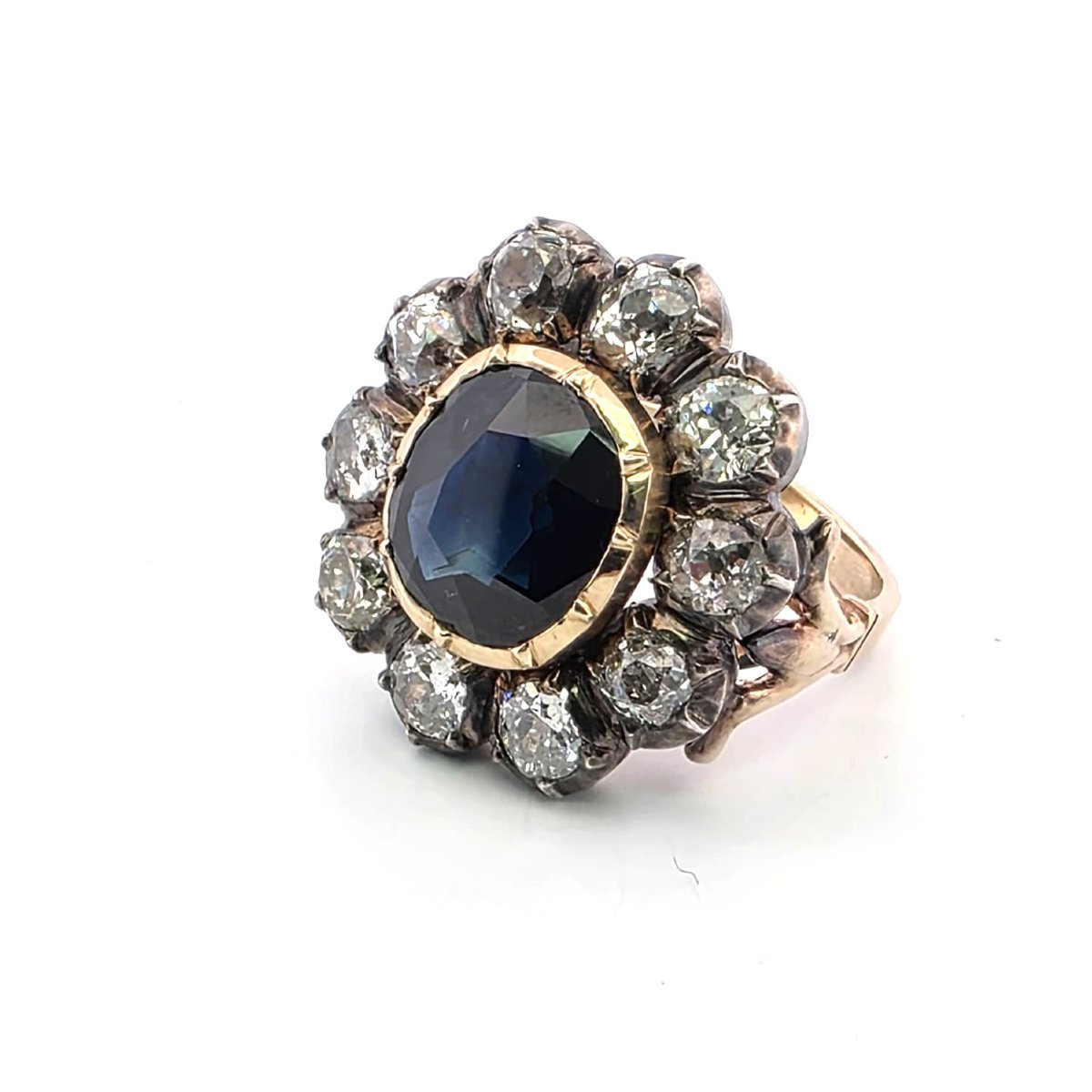 Anello in oro giallo basso e argento con diamanti e zaffiro-photo-2