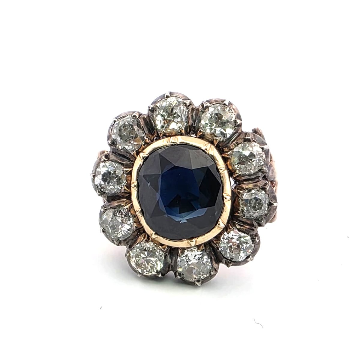 Anello in oro giallo basso e argento con diamanti e zaffiro-photo-1