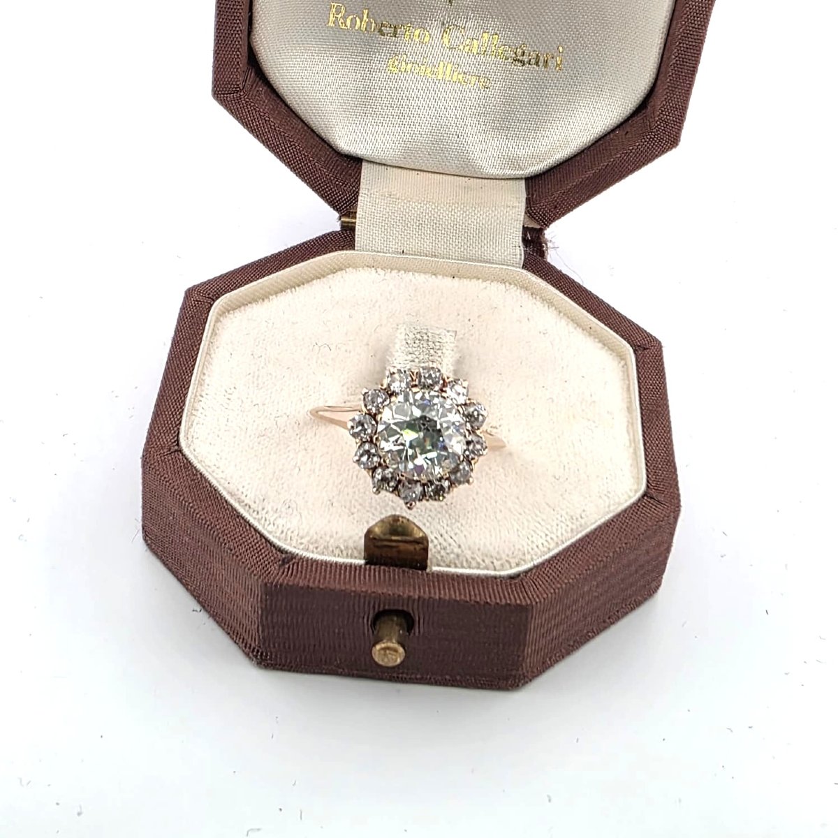 Anello in oro rosa 18kt con diamante centrale e diamanti a contorno