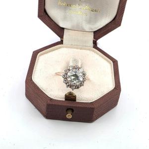 Anello in oro rosa 18kt con diamante centrale e diamanti a contorno