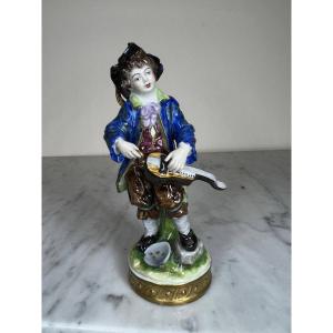 "hurdy-gurdy Player" German Polychrome Porcelain, Late 19th Century